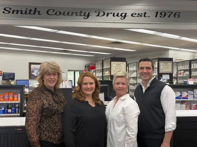 Pharmacist consulting with patient